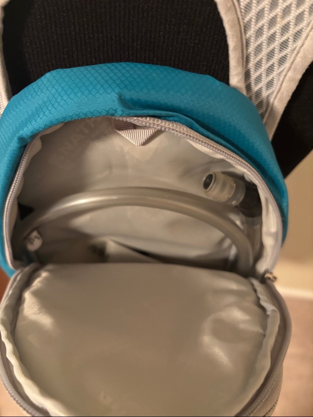 Nathan Women’s Teal and White Hydration Backpack - Picture 4 of 5